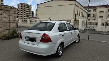 kia cerato 2008: Chevrolet Aveo: 1.4 l | 2011 il 215489 km Sedan — 9