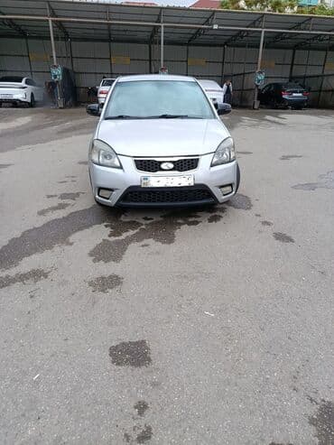 автомобиль фольксваген поло: Kia Rio: 1.5 л | 2010 г. Хэтчбэк — 4