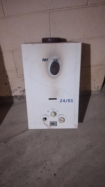 kranlarin satisi: Qazla işləyən divar tipli suqızdırıcı - Qoşulma: Su giriş-çıxış və — 1