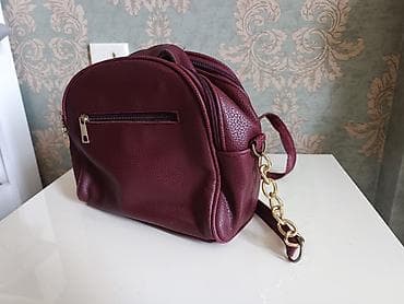 aksesuarlar: Çanta çox genişdir 2 hissəsidir arxada da balaca cibi var. Çox az — 3