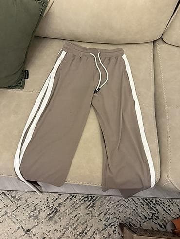 ağ krasofka: İdman şalvarı – bej/qəhvəyi rəngdə, yanlardan ağ zolaqlı. - Elastik — 1