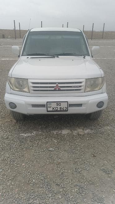 daewoo lanos nece masindir: Mitsubishi Pajero iO (GDI) – ağ rəngli, 5 qapılı kompakt SUV. İlkin — 2