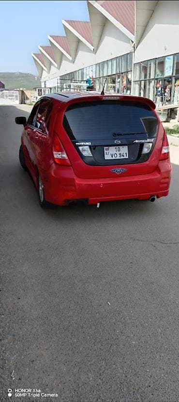 lada baqaj: Suzuki Aerio hatchback – qırmızı rəng - Kuzov: 5 qapılı hatchback, tam — 1