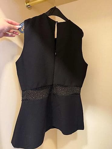Şəxsi əşyalar: Qara rəngli, qolsuz peplum top. Yuvarlaq yaxalıq və bel hissəsində — 3