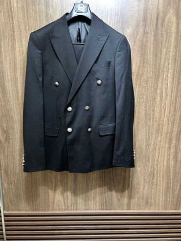 kişi ucun klassik qara kostyum: Kiwi Kostyumu satilir malamerka 52 razmerdi 1defe geyinilib 160 azn — 1