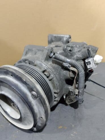 оригинальные запчасти тойота: İşlənmiş avtomobil kondisionerinin kompressoru. Bu kompressor — 2