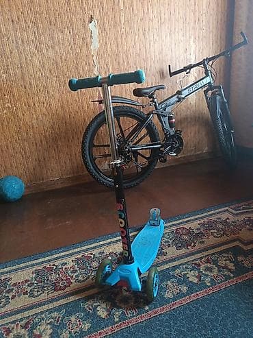 teker velosiped: Usaq ucun skuterdir. Hech bir prablemi qirigi sinigi yoxdur. 2 teker — 3