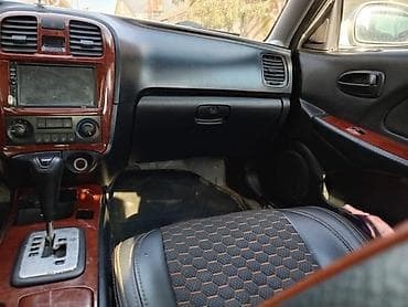 suktur: Hyundai Elantra (J3) sedan, gümüşü rəng. - Kuzov: 4 qapılı sedan — 8
