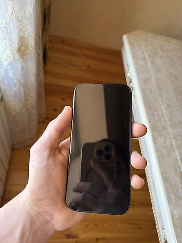ikinci el ipad: IPhone 16 Pro, 256 GB, Qara, Face ID — 1