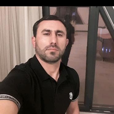 Qara polo köynək - Rəng: qara - Dizayn: klassik polo yaxalı, qısaqol