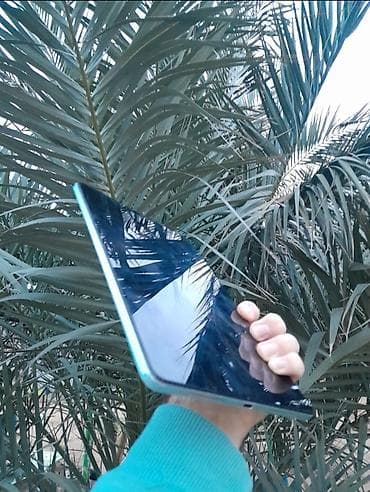 kalonka islenmis: Redmi Tablet – Model 2023, mavi rəng Xüsusiyyətlər: - RAM: 6 GB - — 4