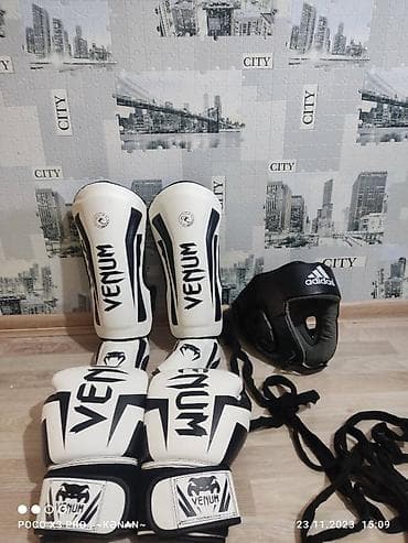 İdman formaları: 5 dəfə İşlənmiş.Əlcək 14 oz.Ayaqliq L razmer kask və bint — 2