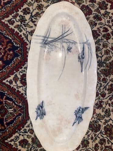 sakura qablari: Bu oval formalı, ağ rəngli keramika süfrə qabı həm funksional, həm də — 1