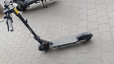 Velosipedlər: Elektrikli skuter – şəhər içi sürətli və rahat hərəkət üçün — 1