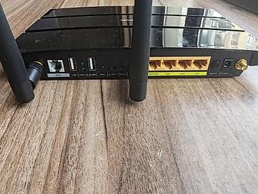 note: TP-Link 300Mbps Wireless N Gigabit ADSL2+ Modem Router (TD-W8970) Həm — 3