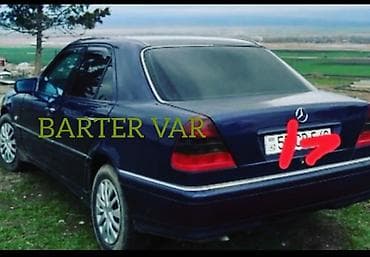 07 satılır: Mercedes-Benz E-sinfi (W210), sedan, tünd mavi rəng. - Kuzov: 4 qapı — 4