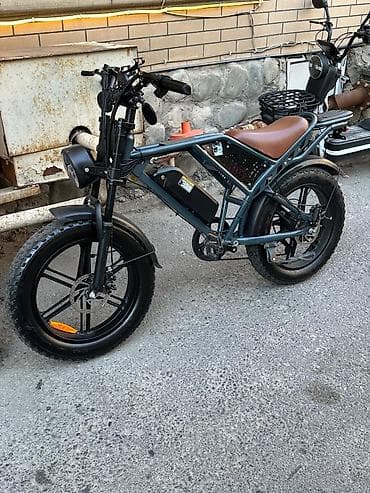 Elektrikli velosiped, retro-moped üslubunda dizaynla təqdim olunur