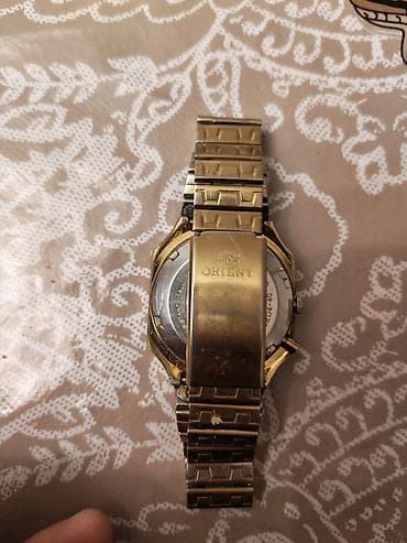 qol: Qol saatı, Orient, rəng - Qızılı — 5