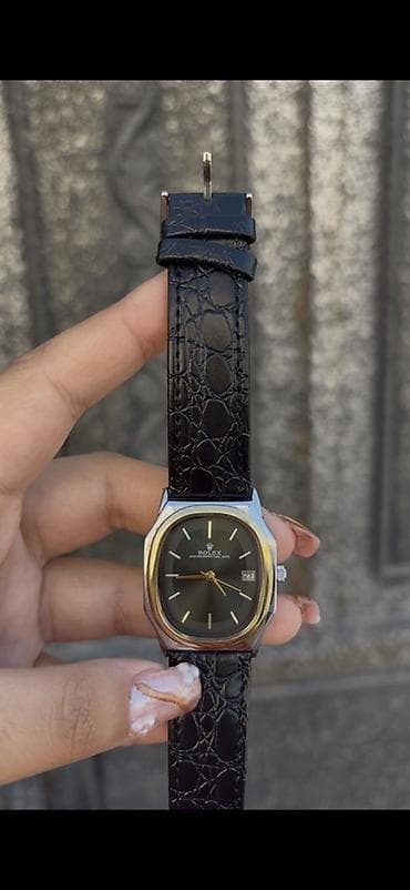 qol saat sekilleri: Klassik üslubda qol saatı - Marka: Rolex (korpus arxasında “Stainless — 2