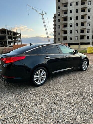 traktor altlıqlı qara qadın bosonojkaları: Kia Optima: 2.4 l | 2013 il Sedan — 14