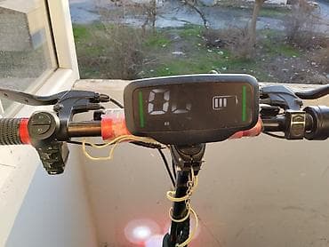 електро велосипед: Elektrikli skuter – güclü ikili amortizasiya və iri təkərlər — 3