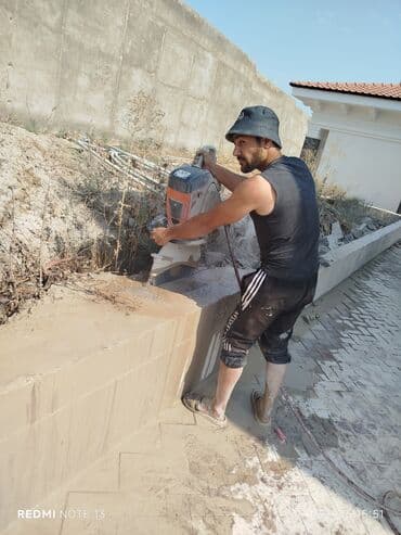 malyar işi: Səssiz tozsuz səliqəli kəsim. Beton katlavan monolit kubik — 2