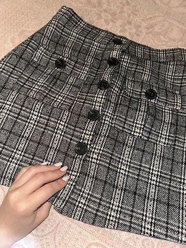 Qadın ətəyi – qara-ağ dama (plaid) naxışlı, qışlıq/yarı-qalın toxuma -