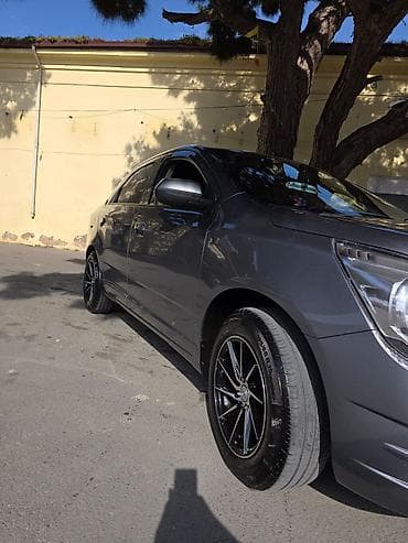 super soco tc: Chevrolet Cobalt sedan - Korpus: boz rəng, 4 qapı, aerodinamik — 3