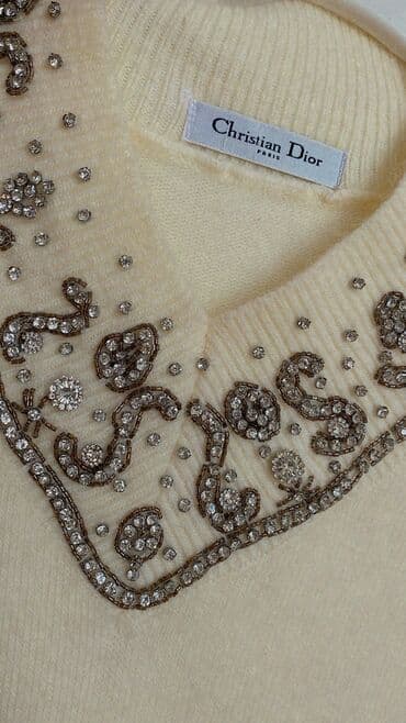 atlas don modelleri: Ağ yun don.Qol ucları və ətək krujevalı. Coco Baku mağazasından 120 — 2