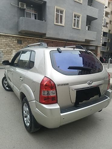 guzgusu: Hyundai Tucson (1-ci nəsil) krossover/SUV - Korpus rəngi: açıq gümüş — 7