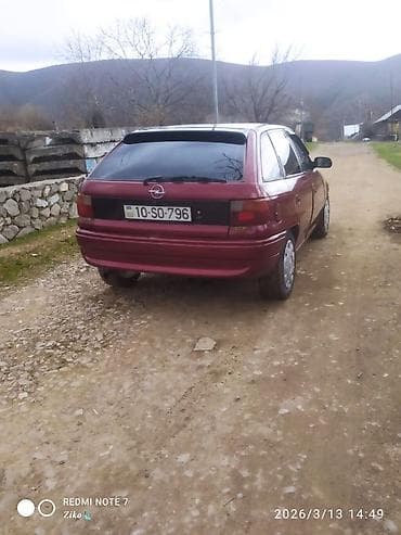 prius satışı: Opel Astra F hatchback, 5 qapı, tünd qırmızı rəng - Şüşələr: yan və — 2