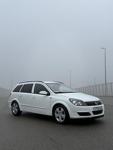 elektrikli moped: Opel Astra H Caravan (Universal), ağ rəng Texniki xüsusiyyətlər və — 3