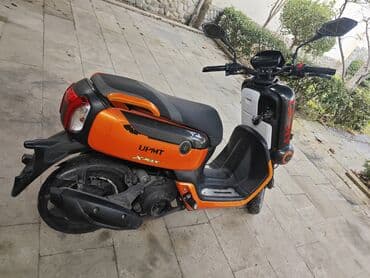 led panel: UPMT X-MAX skuter – parlaq narıncı-qara dizayn, şəhər üçün çevik və — 4