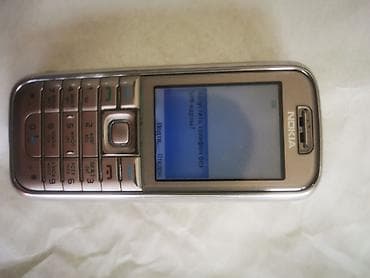 ТВ и видео: Nokia цвет - Коричневый, Кнопочный — 8