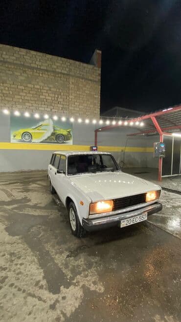 диски титановые ваз 2101 недорого: VAZ 2104 universal, ağ rəng. - Kuzov: 5 qapılı universal gövdə — 8