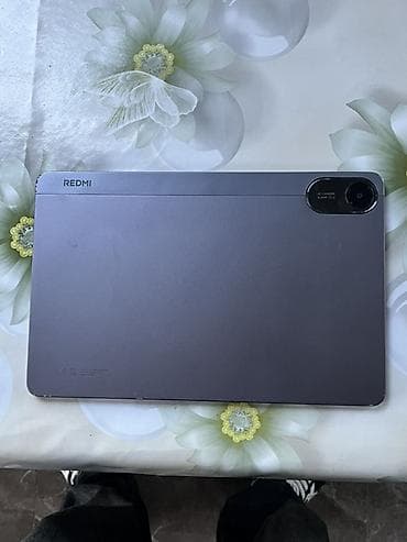 xiaomi tv box s: Planşet – 10–11 düym sinifində, nazik çərçivəli, metal gövdə. Əsas — 6
