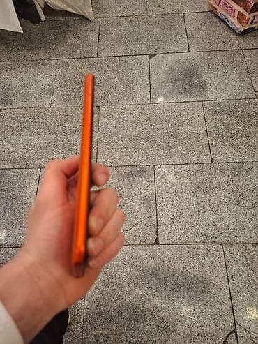 4g mifi modem bakcell: Redmi smartfon – narıncı rəngli korpus, arxa paneldə teksturalı səth — 6