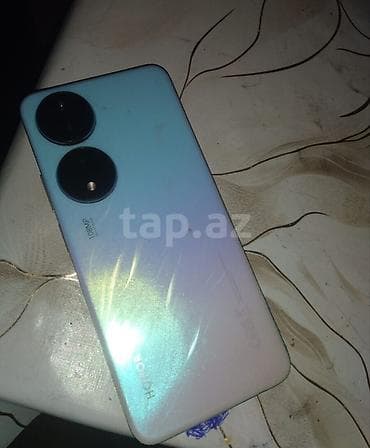 ayfon es 7: Honor X7b, 128 GB, rəng - Mavi, Face ID — 2