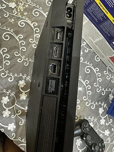 icarə playstation: Sony PlayStation 4 Slim oyun konsolu dəsti. 0 dan məndə olub. Əla — 3