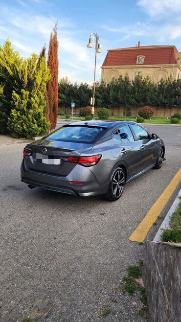 Digər nəqliyyat: Nissan Sentra SR – sedan Əsas xüsusiyyətlər: - Kuzov: 4 qapılı sedan — 1