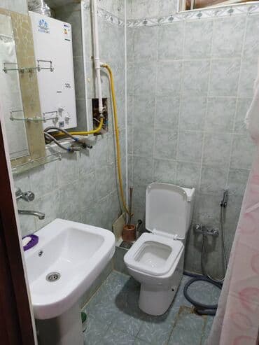 şirvan kiraye: 28 may metrosunun 3-cü çixişında yerləşən 5 mertebeli binanın 1-ci — 4