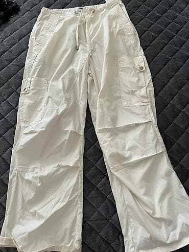 Açıq krem rəngində geniş kəsimli cargo şalvar. -S razmer -Mavi