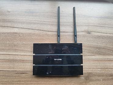 note: TP-Link 300Mbps Wireless N Gigabit ADSL2+ Modem Router (TD-W8970) Həm — 4