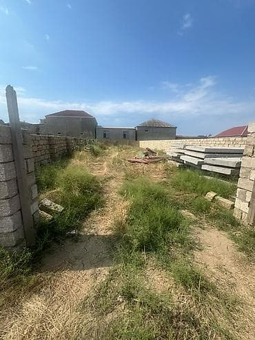 eletde torpaq satilir: Tikinti — 2