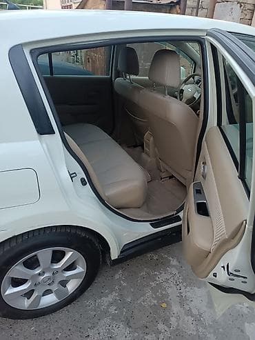 audi 6: Nissan Tiida: 1.6 l | 2011 il Hetçbek — 8