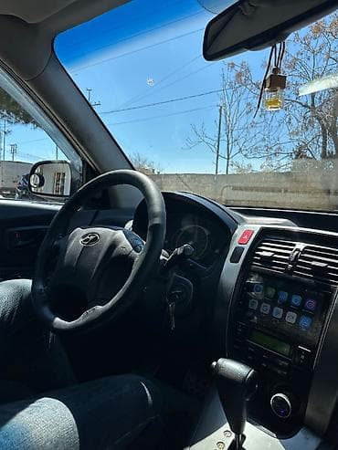 hundai tukson: Hyundai Tucson: 2 l | 2009 il Ofrouder/SUV — 8