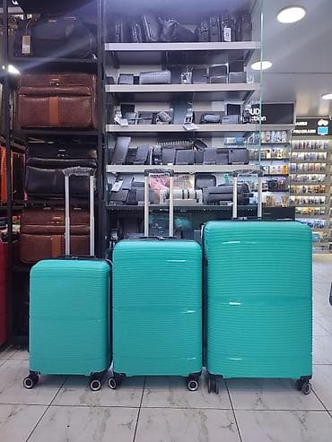 Çamadanlar: 3’lü sərt kabinetli çamadan dəsti – mavi-yaşıl rəng - Korpus: yüngül — 1