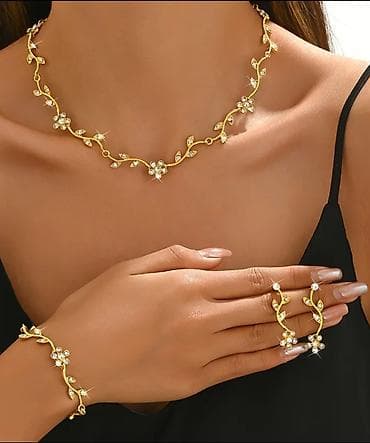 Çantalar: Qızılı rəngli zərgərlik dəstləri 1) Zəncirvari teksturalı dəst - — 2