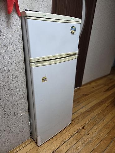 a 31: İki qapılı soyuducu – üstdə dondurucu, altda soyuducu bölmə — 2