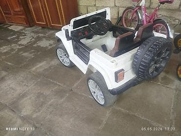 uşaq ucun makasin: Uşaq üçün elektrikli maşın – Jeep tərzli, ağ rəng iki nəfərlikdi pultu — 2